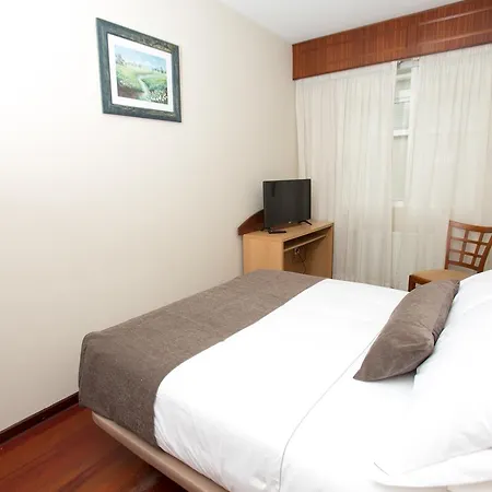 Real Hotel *